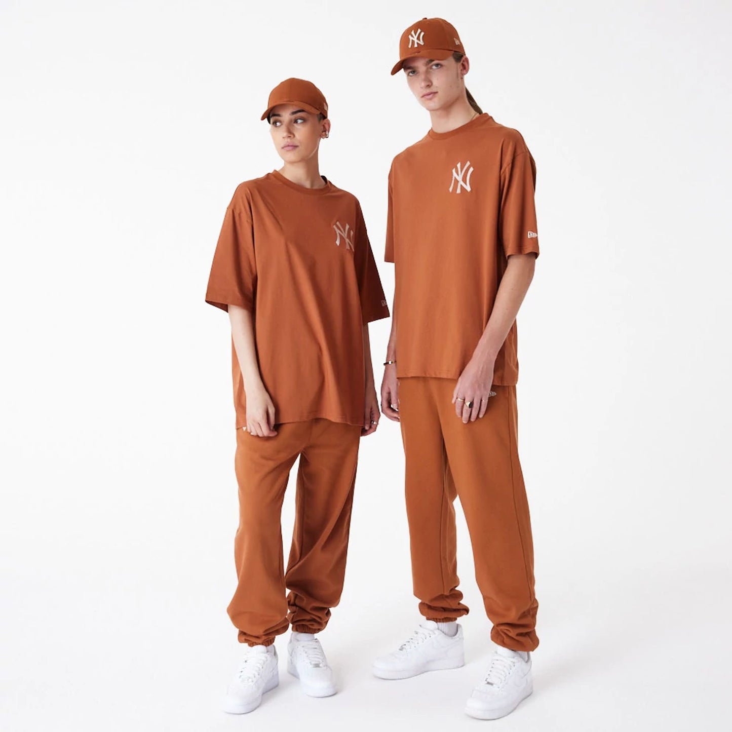 The Male model is wearing New York Yankees League Essential Brown Oversized T-Shirt 8