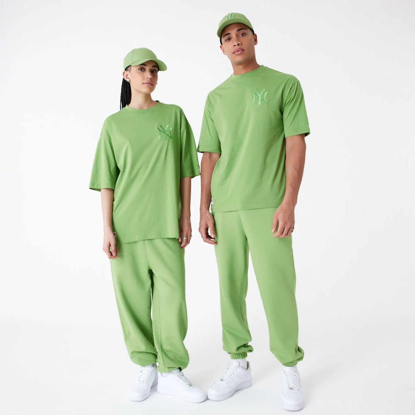 The Male model is wearing New York Yankees League Essential Green Oversized T-Shirt 5