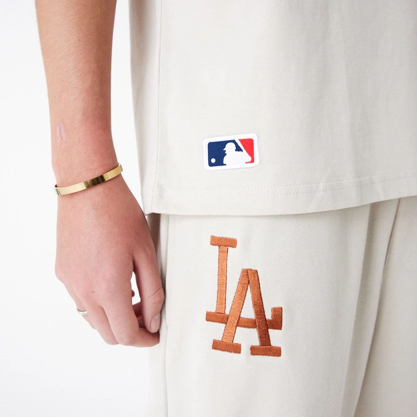 The Male model is wearing LA Dodgers League Essential Stone Oversized T-Shirt 8