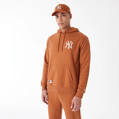 The Male model is wearing New York Yankees League Essential Brown Oversized Pullover Hoodie 12