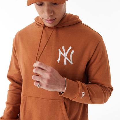 The Male model is wearing New York Yankees League Essential Brown Oversized Pullover Hoodie 9