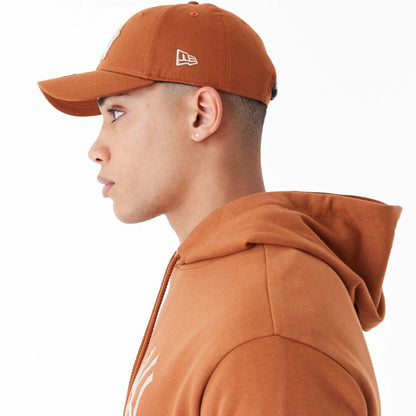 The Male model is wearing New York Yankees League Essential Brown Oversized Pullover Hoodie 5