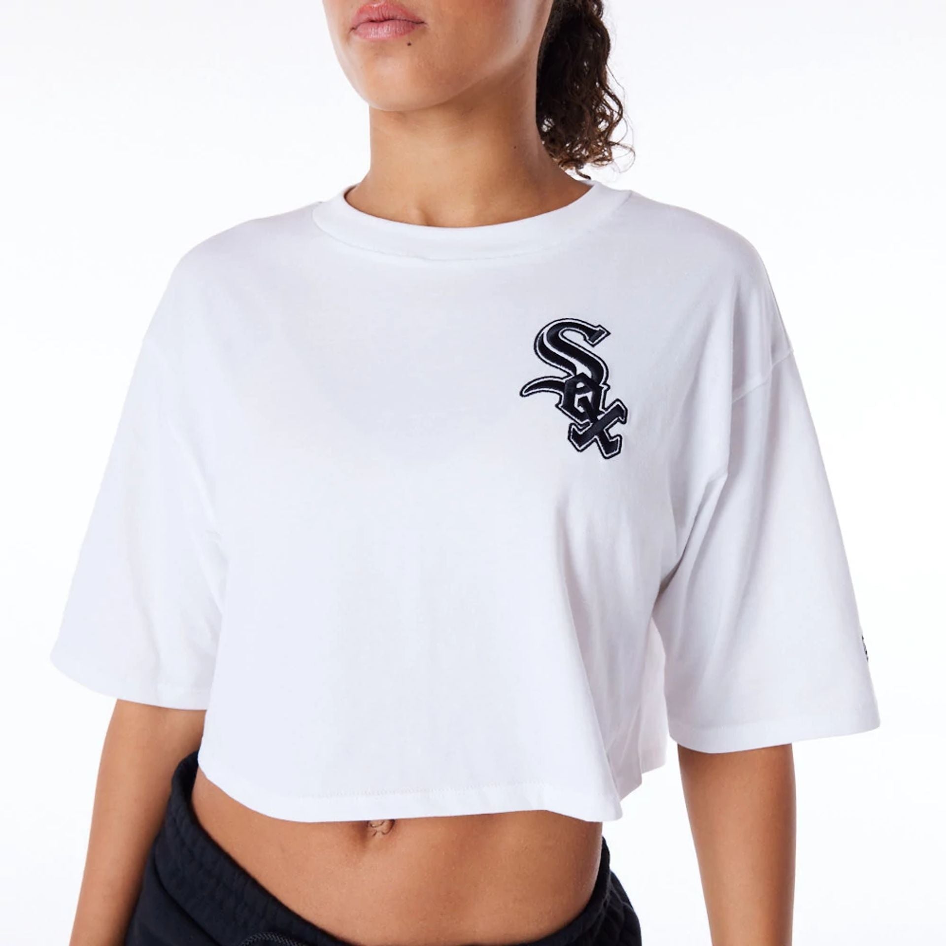 The Female model is wearing Chicago White Sox Womens MLB Lifestyle White Crop T-Shirt 2