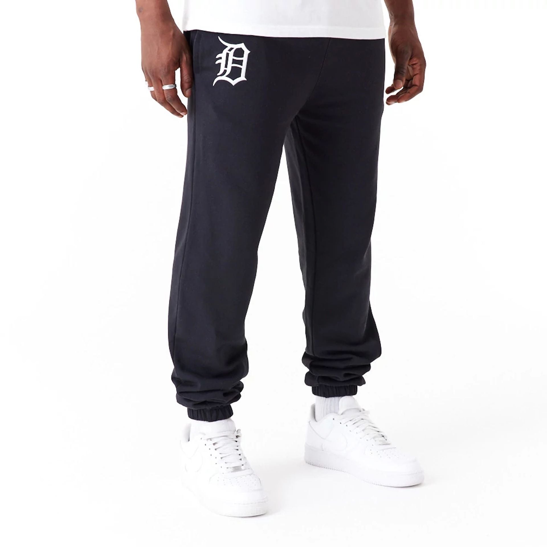 The Male model is wearing Detroit Tigers League Essential Black Joggers 1