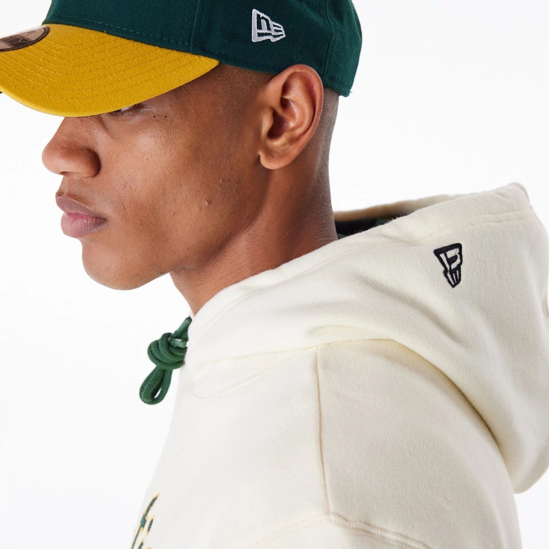 The Male model is wearing Oakland Athletics MLB Chrome White Pullover Hoodie 5