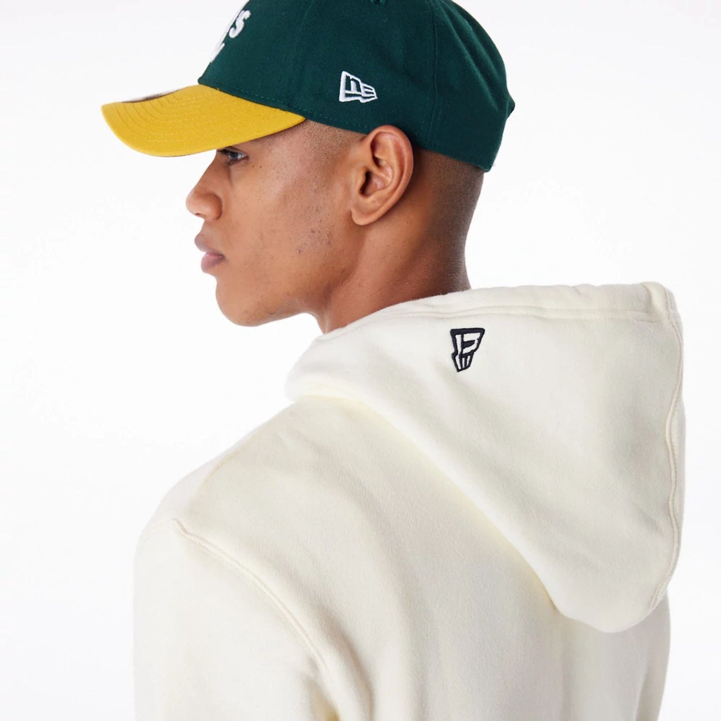 The Male model is wearing Oakland Athletics MLB Chrome White Pullover Hoodie 7