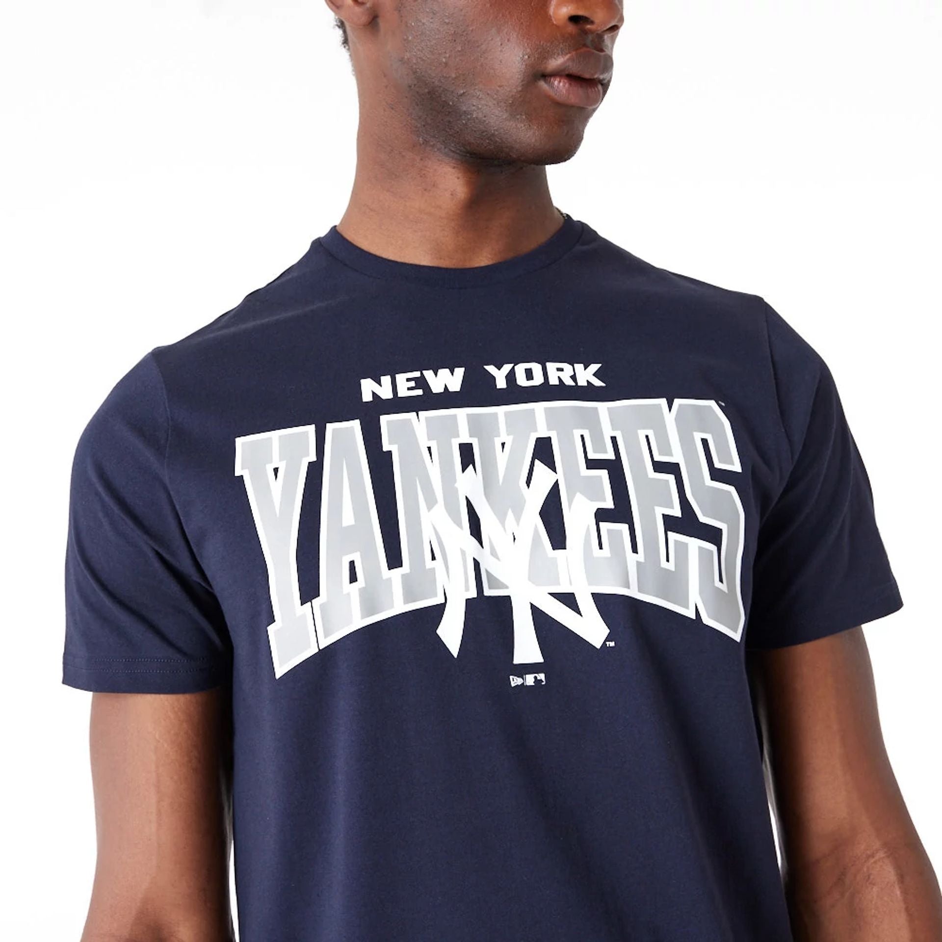 The Male model is wearing New York Yankees MLB Arch Wordmark Graphic Navy T-Shirt 2