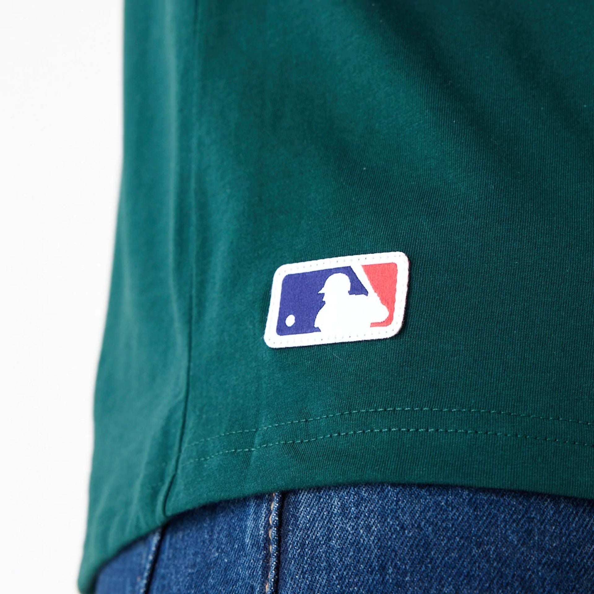 The Male model is wearing Oakland Athletics MLB Arch Wordmark Graphic Dark Green T-Shirt 4