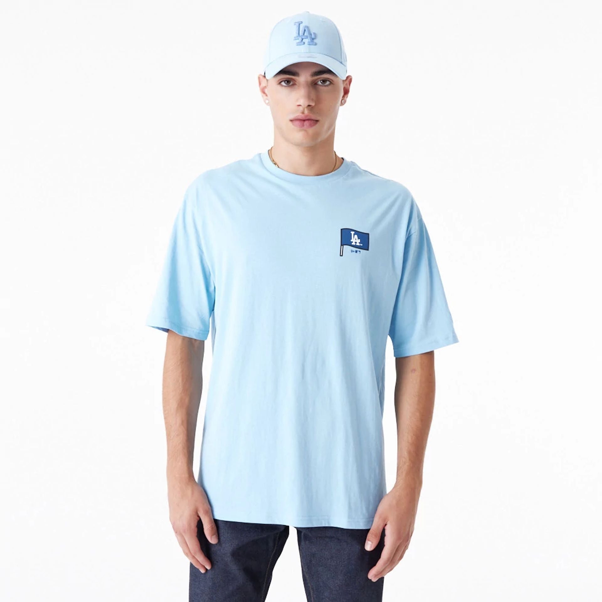 The Male model is wearing LA Dodgers MLB Burger Graphic Pastel Blue Oversized T-Shirt 3