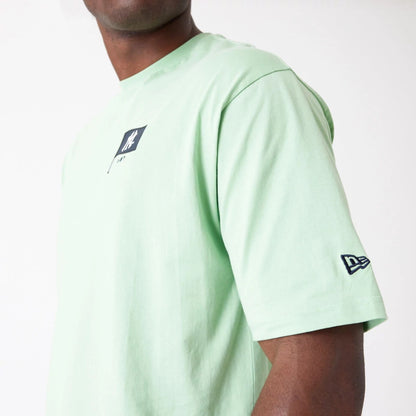 The Male model is wearing New York Yankees MLB Burger Graphic Bright Green Oversized T-Shirt 4