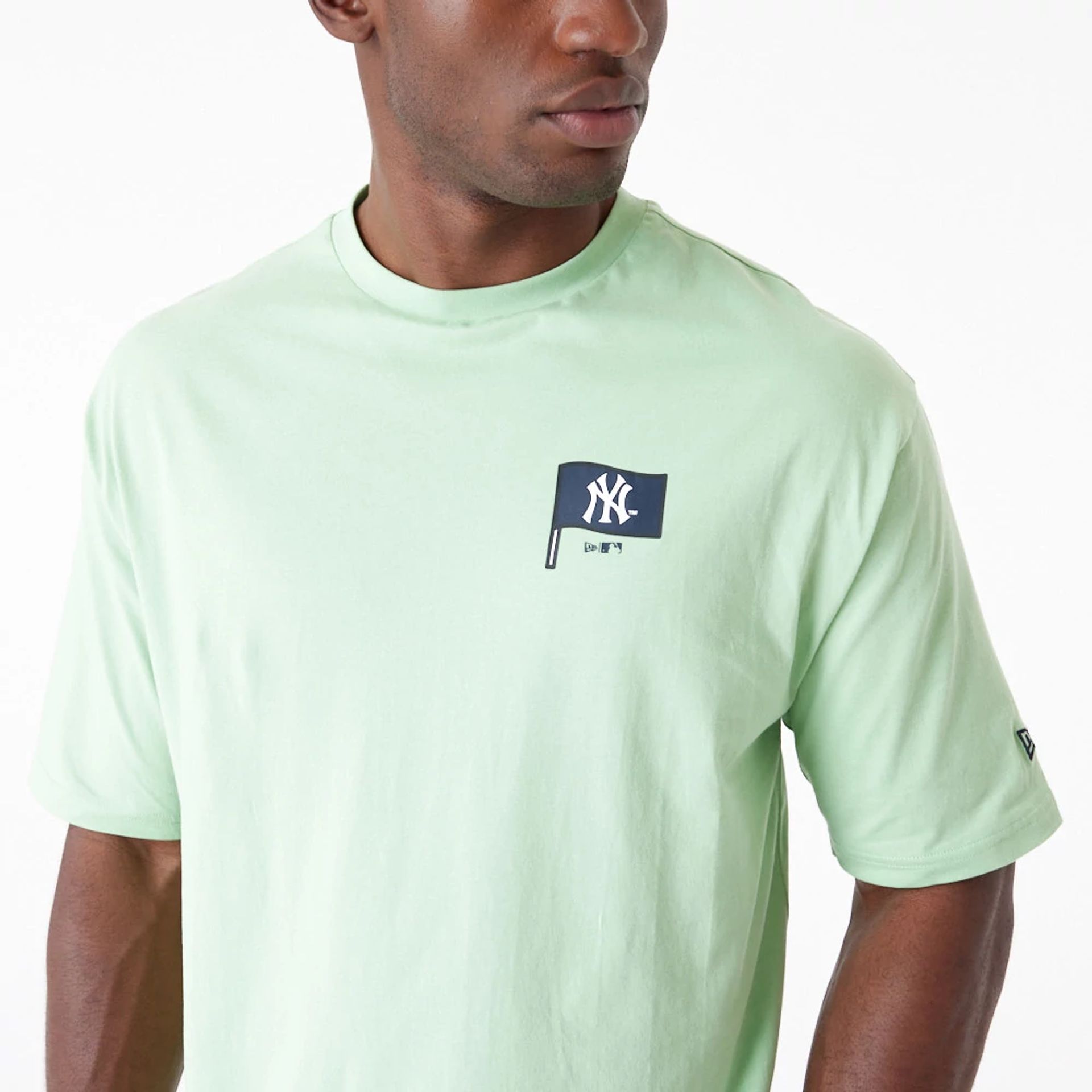 The Male model is wearing New York Yankees MLB Burger Graphic Bright Green Oversized T-Shirt 5