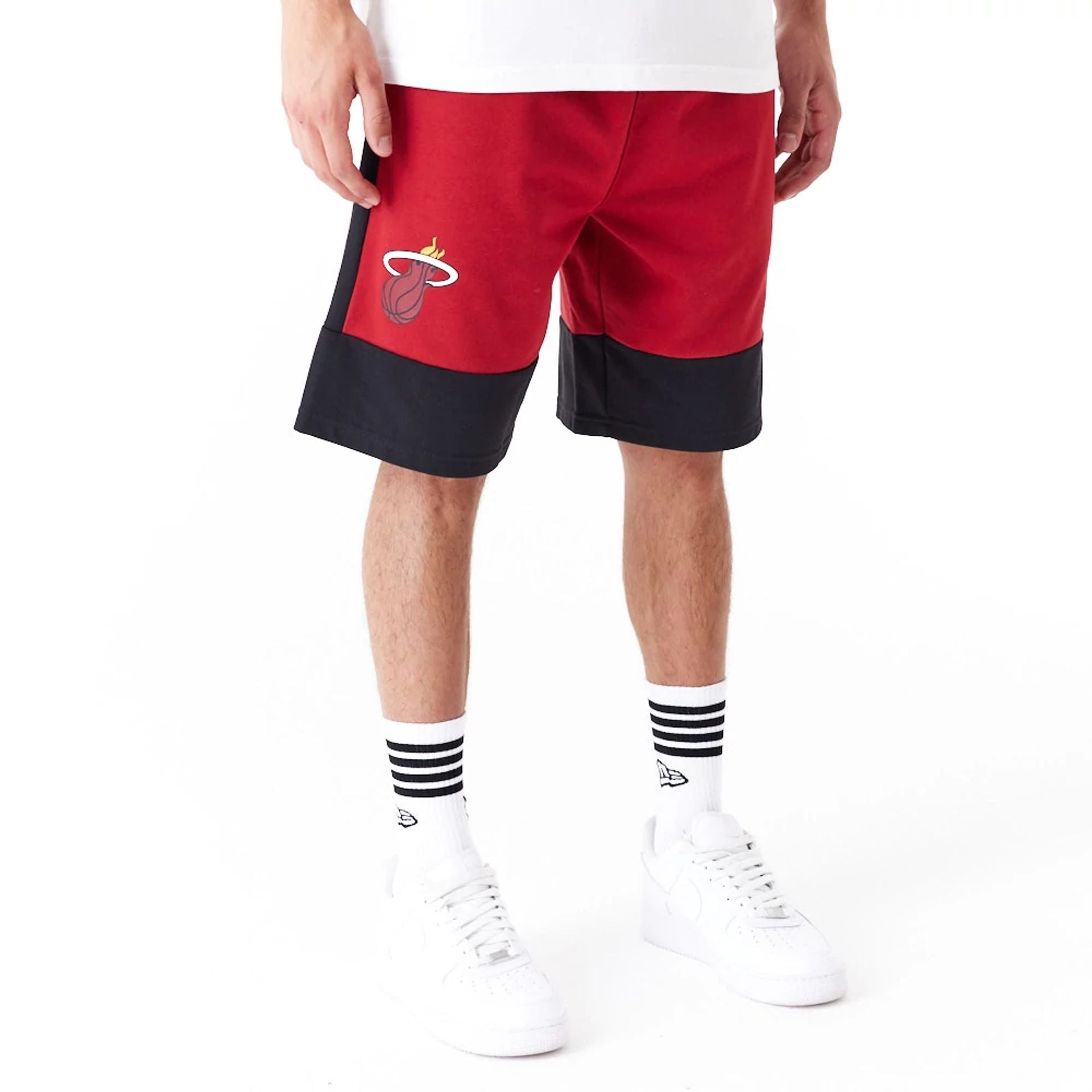 The Male model is wearing Miami Heat NBA Colour Block Dark Red Shorts 1