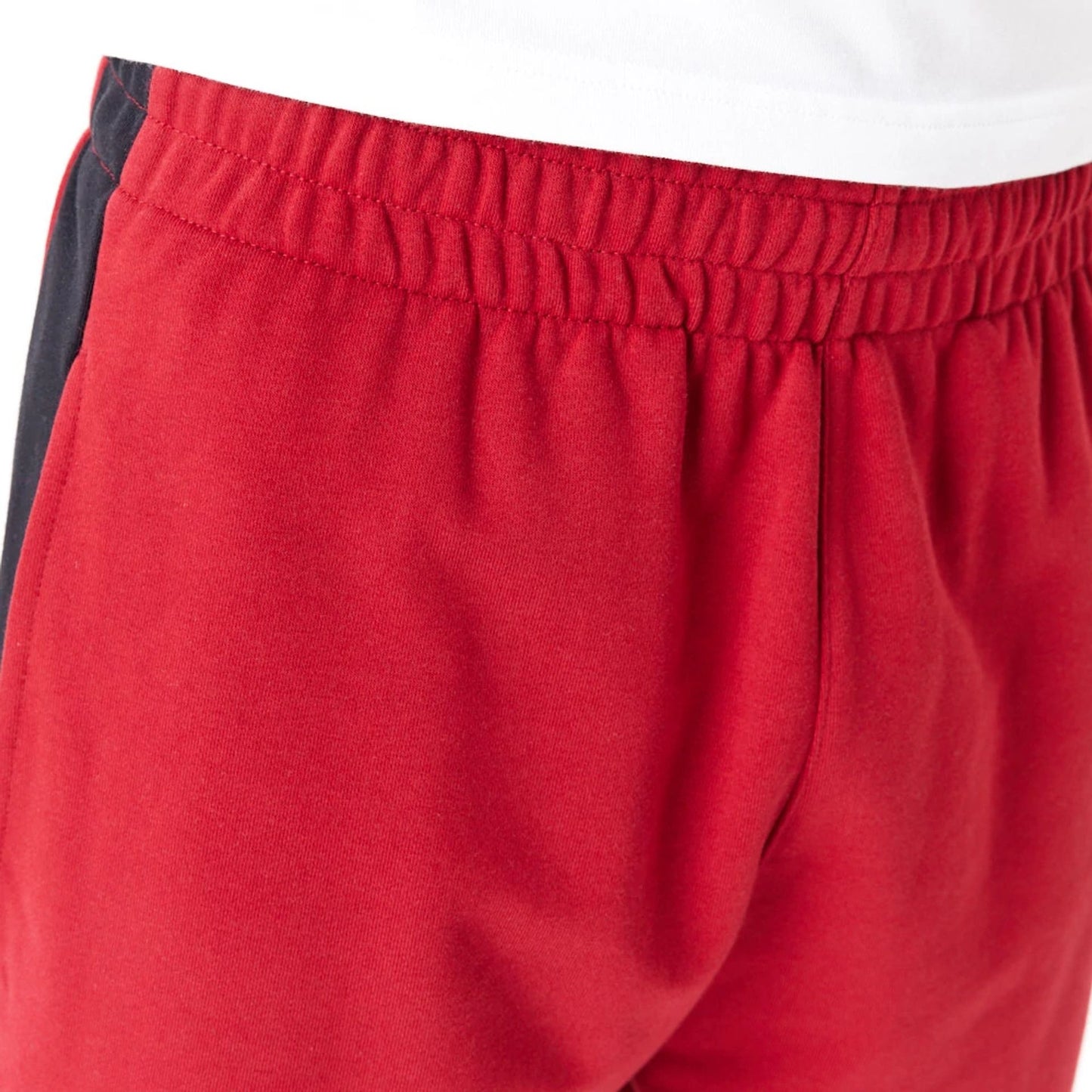 The Male model is wearing Miami Heat NBA Colour Block Dark Red Shorts 6