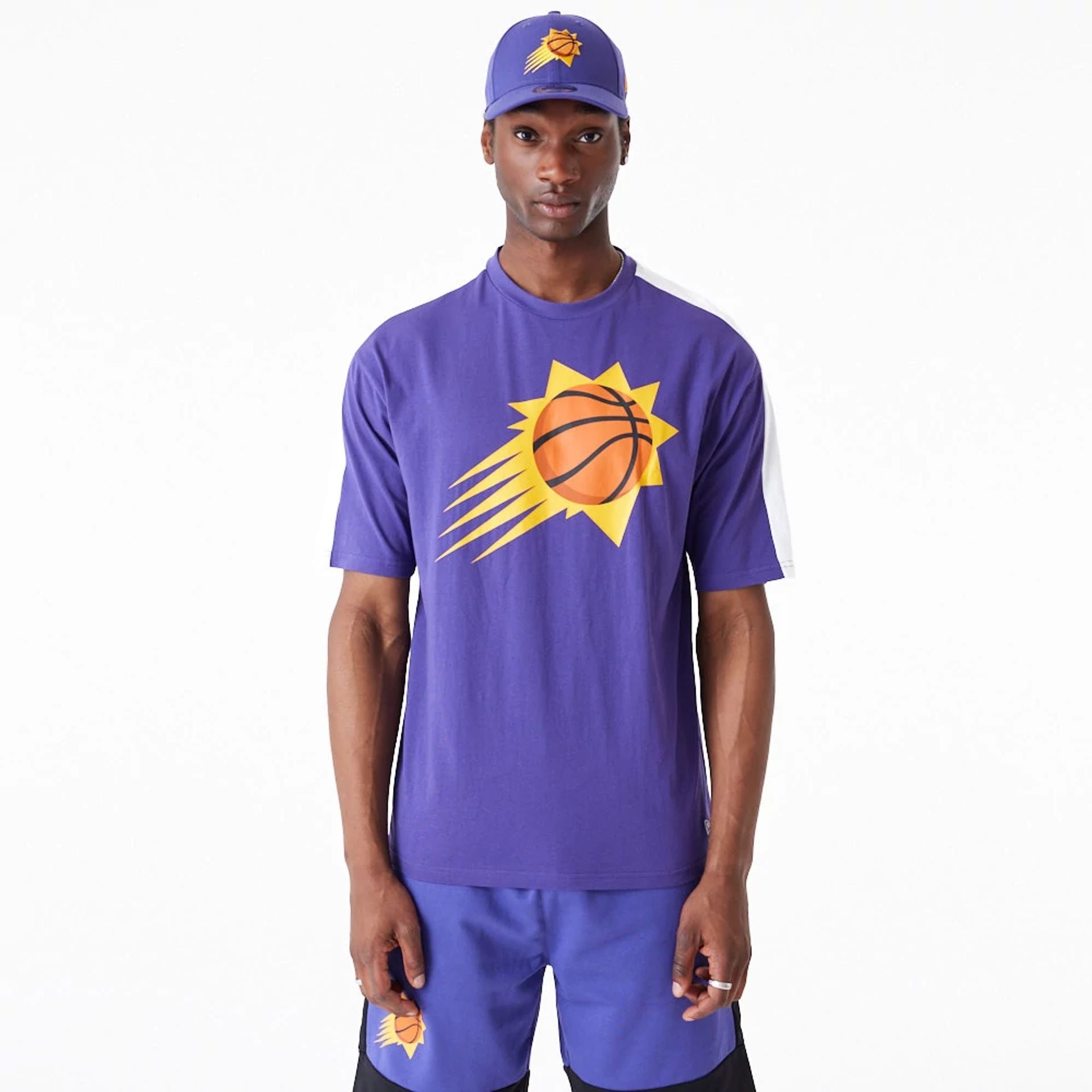 The Male model is wearing Phoenix Suns NBA Colour Block Dark Purple Oversized T-Shirt 1