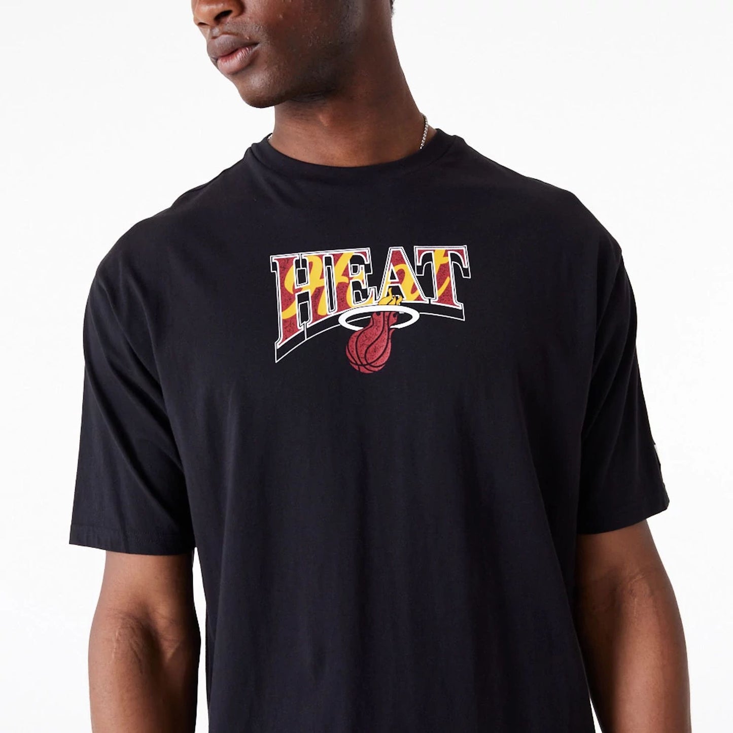 The Male model is wearing Miami Heat NBA Championship Black Oversized T-Shirt 4