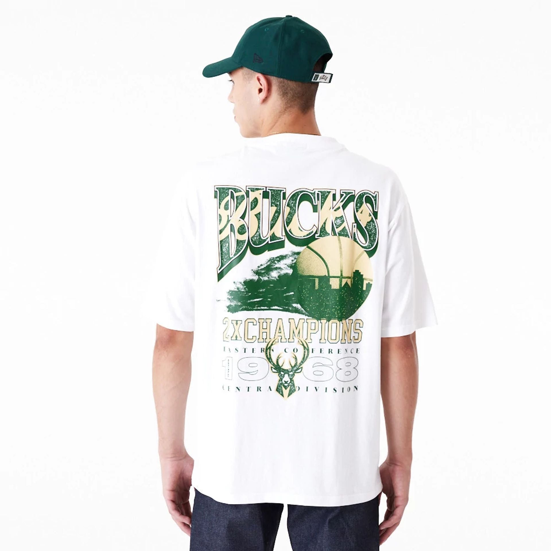 The Male model is wearing Milwaukee Bucks NBA Championship White Oversized T-Shirt 2