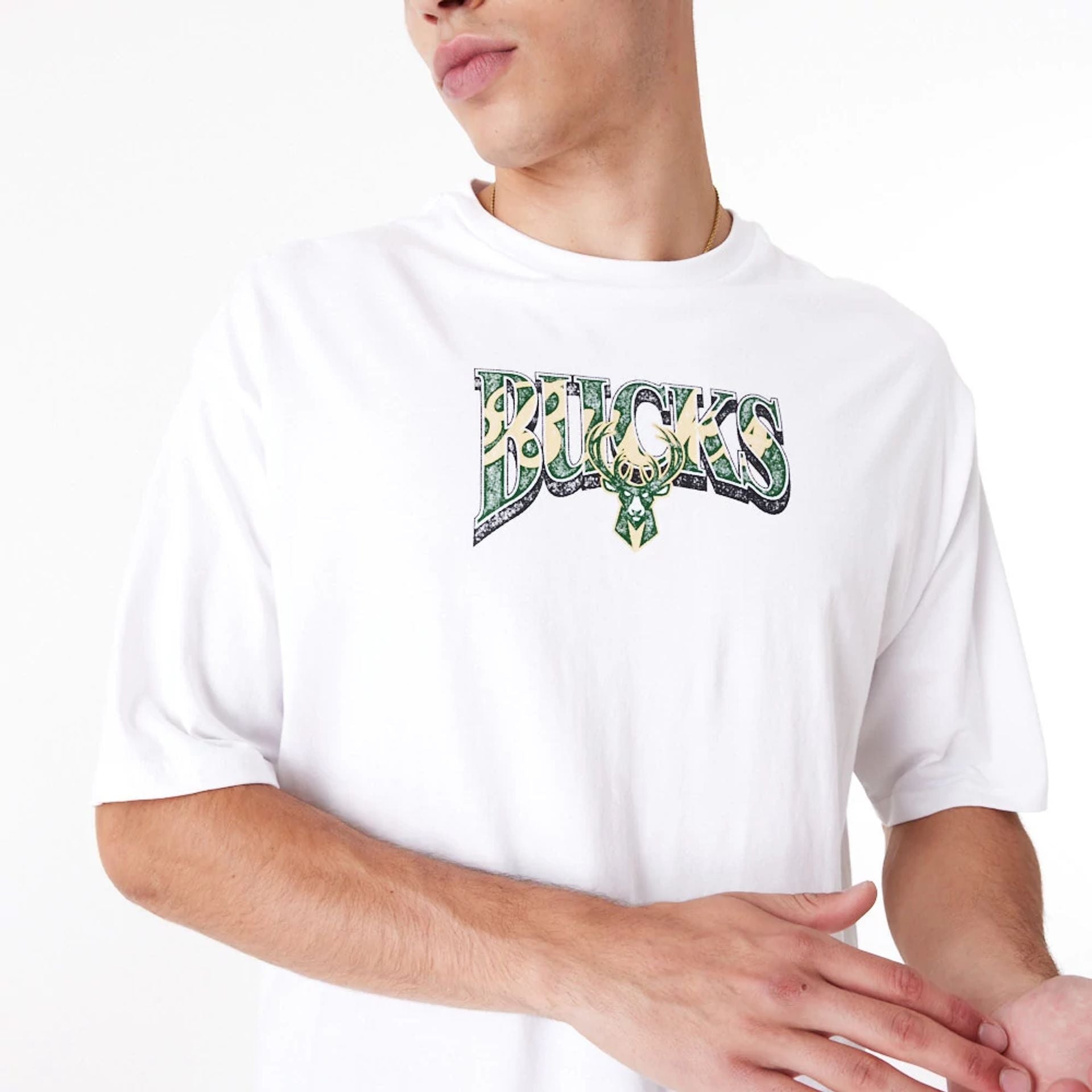 The Male model is wearing Milwaukee Bucks NBA Championship White Oversized T-Shirt 4