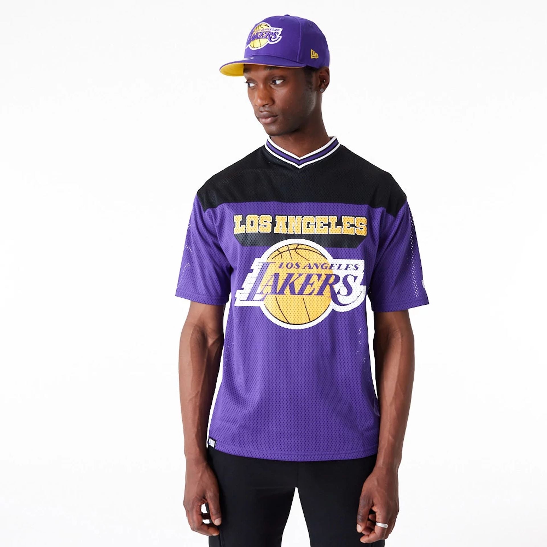 The Male model is wearing LA Lakers NBA Arch Graphic Jersey Purple T-Shirt 1