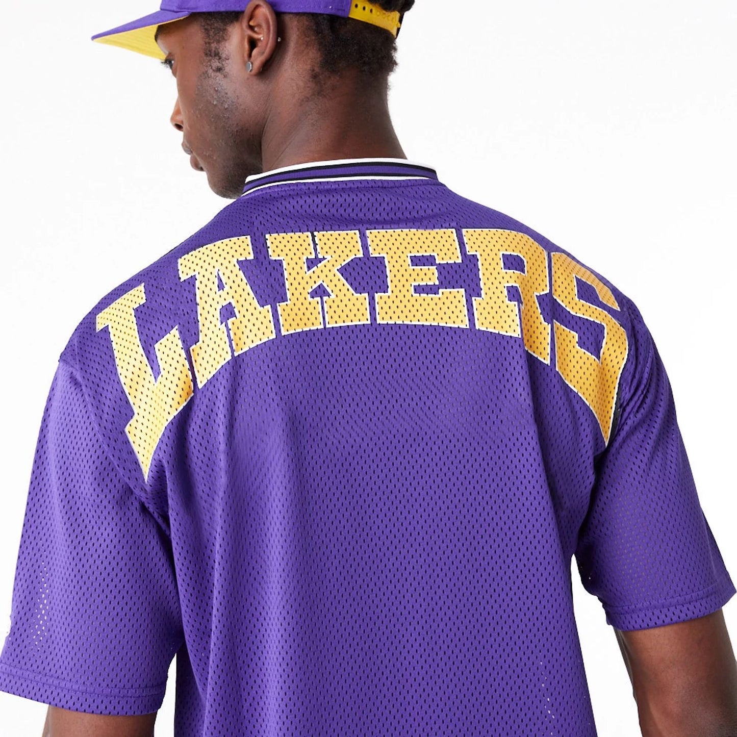 The Male model is wearing LA Lakers NBA Arch Graphic Jersey Purple T-Shirt 6