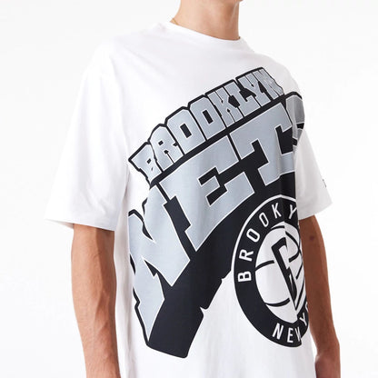 The Male model is wearing Brooklyn Nets NBA Large Wordmark White Oversized T-Shirt 2