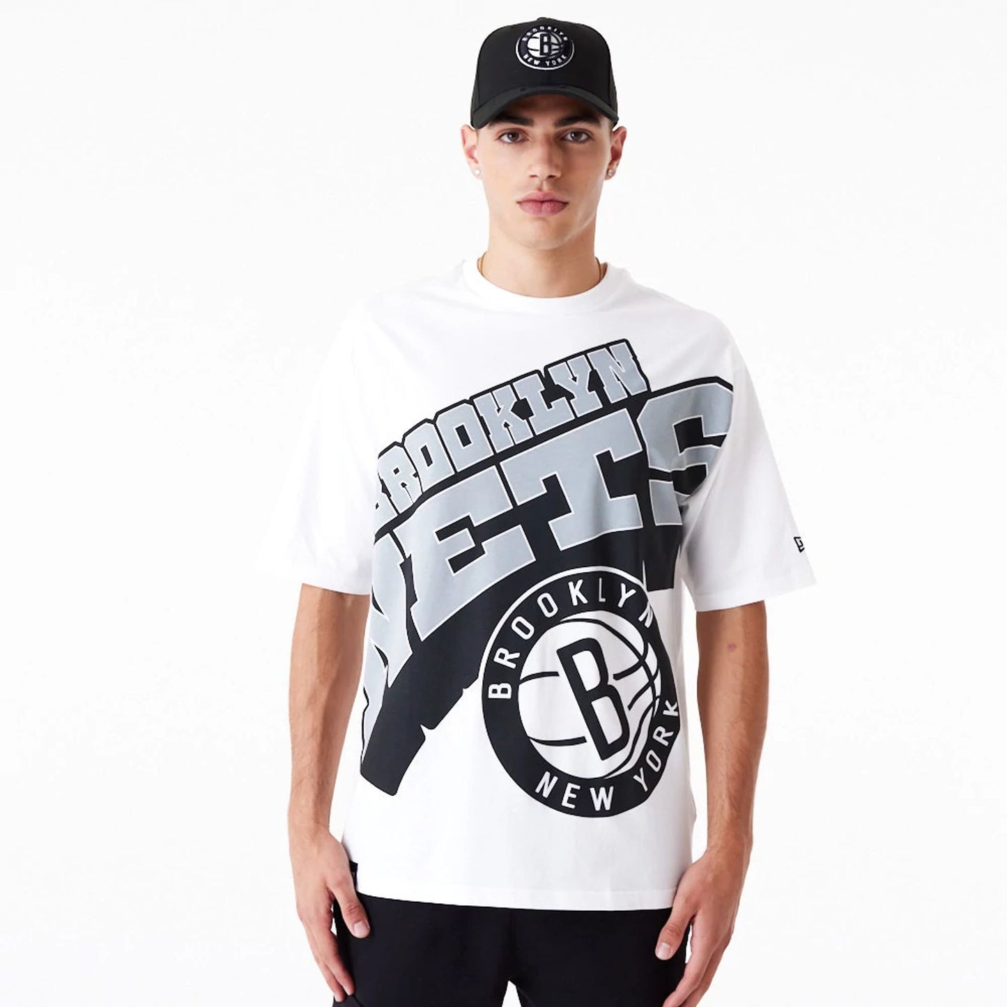 The Male model is wearing Brooklyn Nets NBA Large Wordmark White Oversized T-Shirt 1