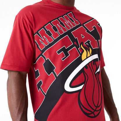 The Male model is wearing Miami Heat NBA Large Wordmark Dark Red Oversized T-Shirt 2