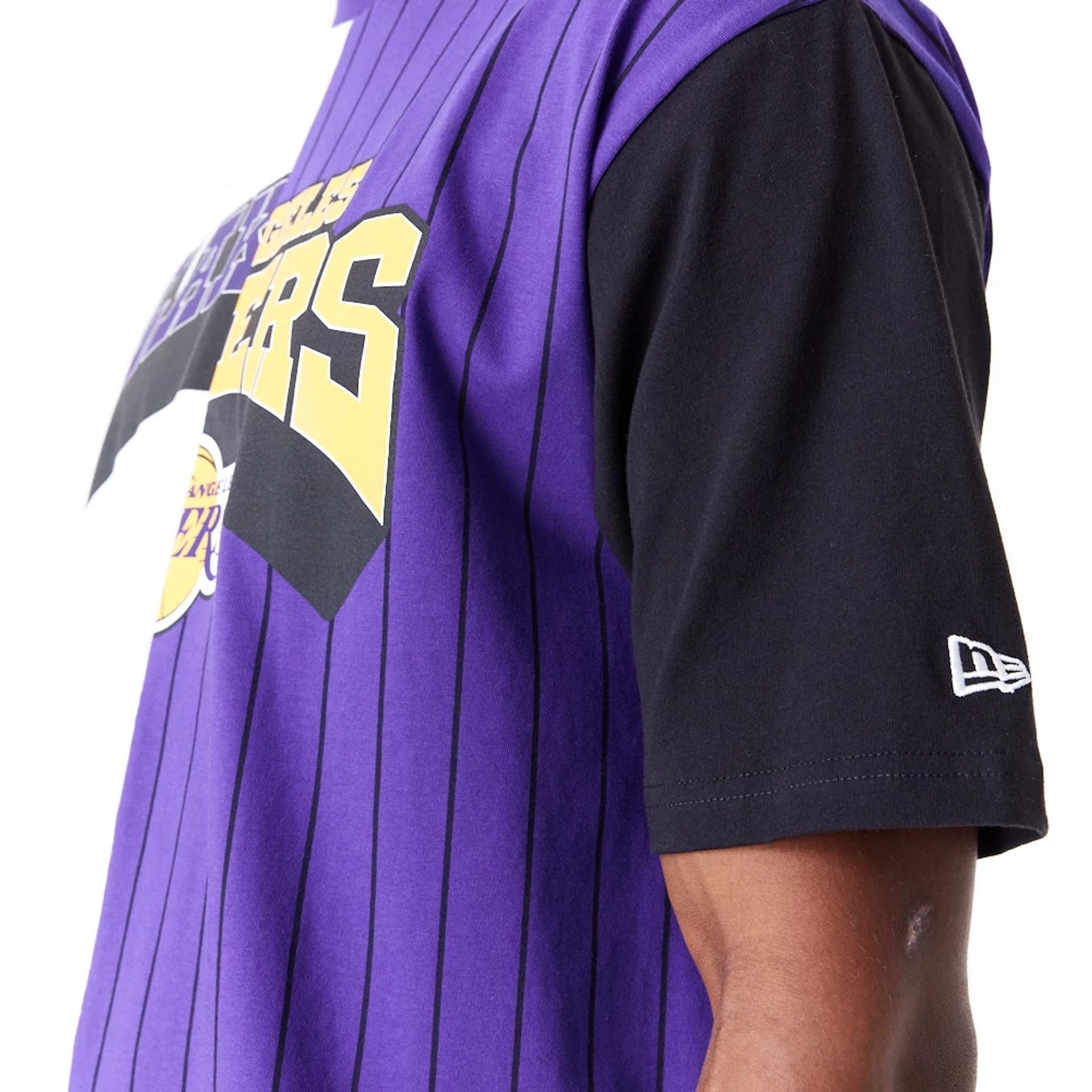 The Male model is wearing LA Lakers NBA Half Pinstripe Purple Oversized T-Shirt 2