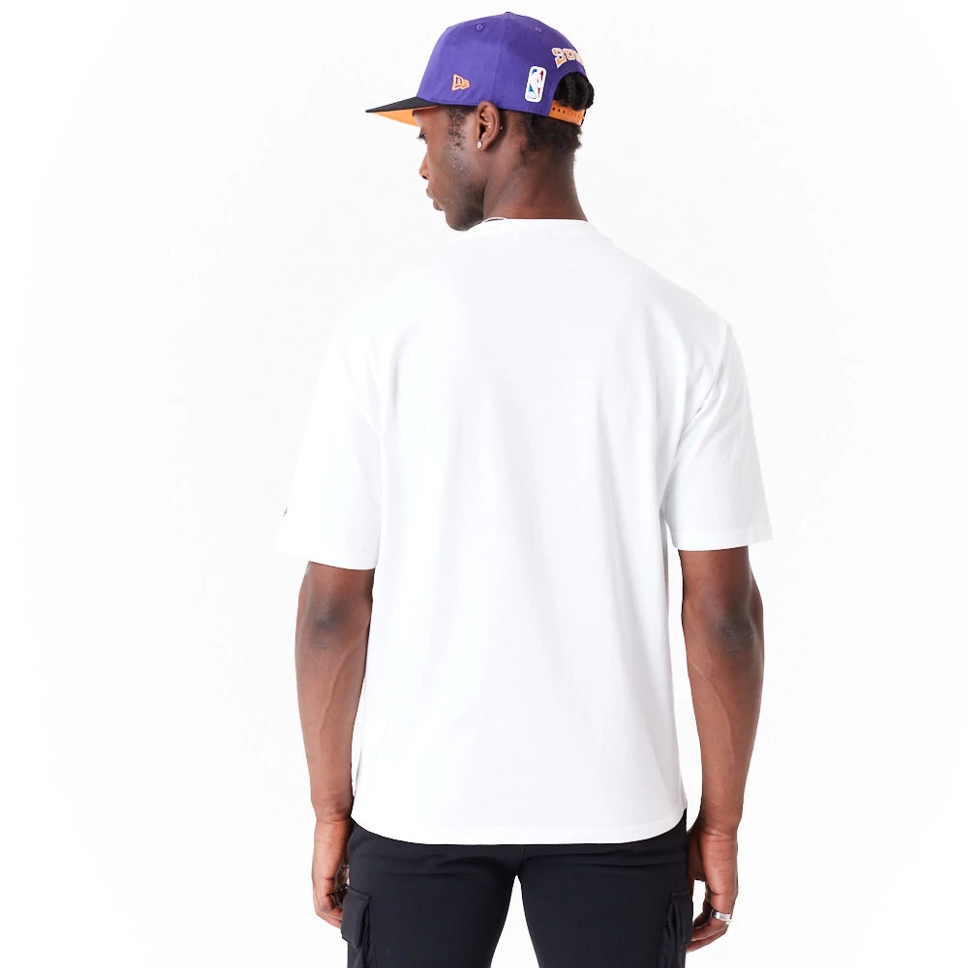 The Male model is wearing Phoenix Suns NBA Large Wordmark White Oversized T-Shirt 3