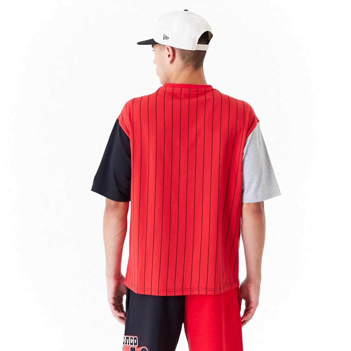 The Male model is wearing Chicago Bulls NBA Half Pinstripe Red Oversized T-Shirt 4