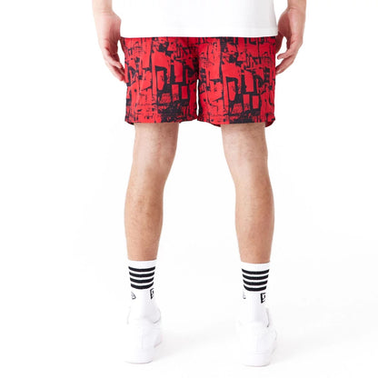 The Male model is wearing Chicago Bulls NBA All Over Print Red Shorts 6