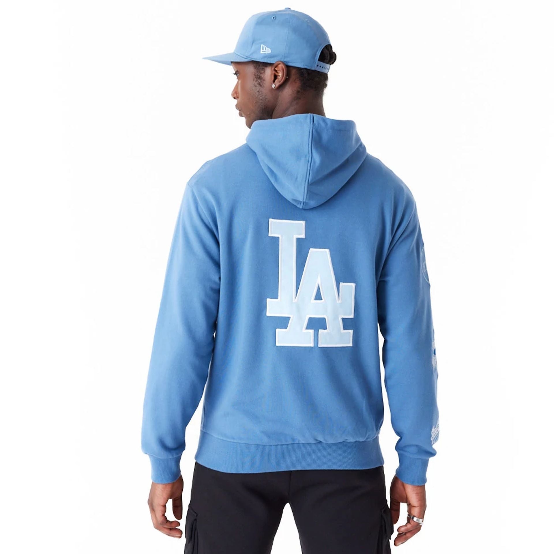 The Male model is wearing LA Dodgers MLB World Series Blue Oversized Pullover Hoodie 2