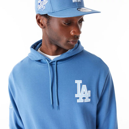 The Male model is wearing LA Dodgers MLB World Series Blue Oversized Pullover Hoodie 4