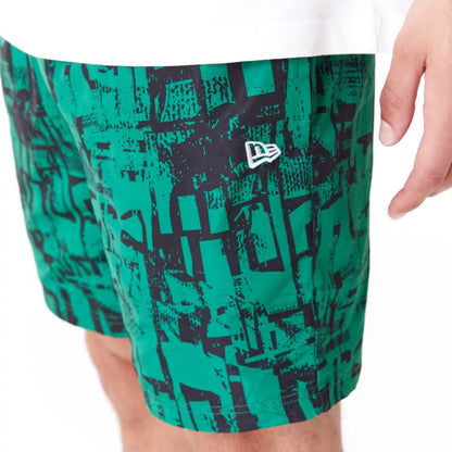 The Male model is wearing Boston Celtics NBA All Over Print Green Shorts 2