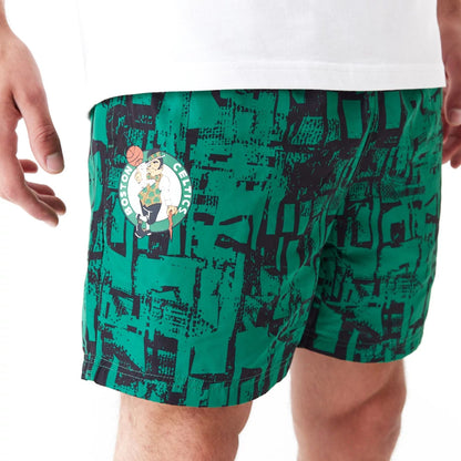 The Male model is wearing Boston Celtics NBA All Over Print Green Shorts 3