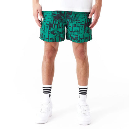 The Male model is wearing Boston Celtics NBA All Over Print Green Shorts 6