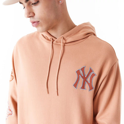 The Male model is wearing New York Yankees MLB World Series Brown Oversized Pullover Hoodie 4