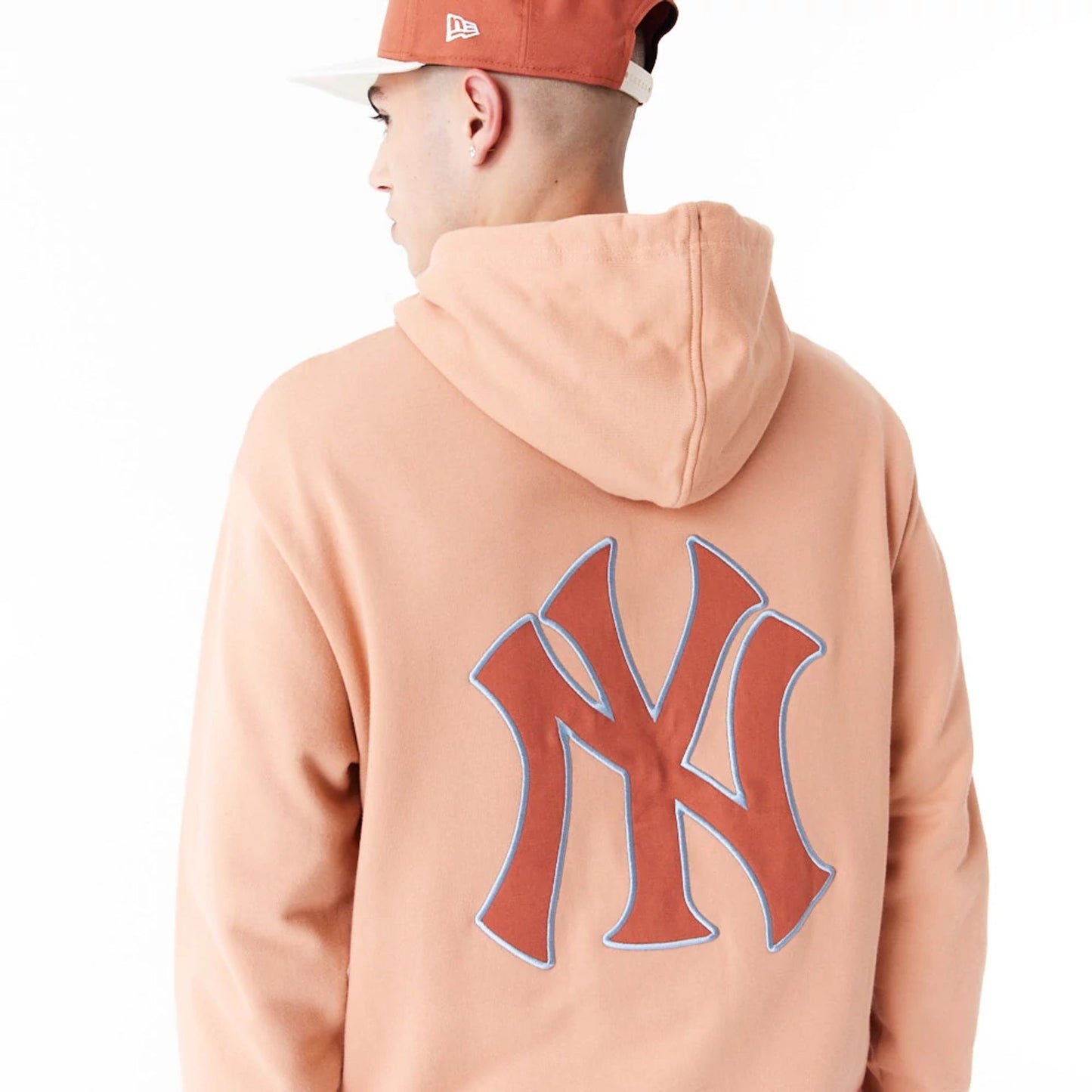 The Male model is wearing New York Yankees MLB World Series Brown Oversized Pullover Hoodie 6