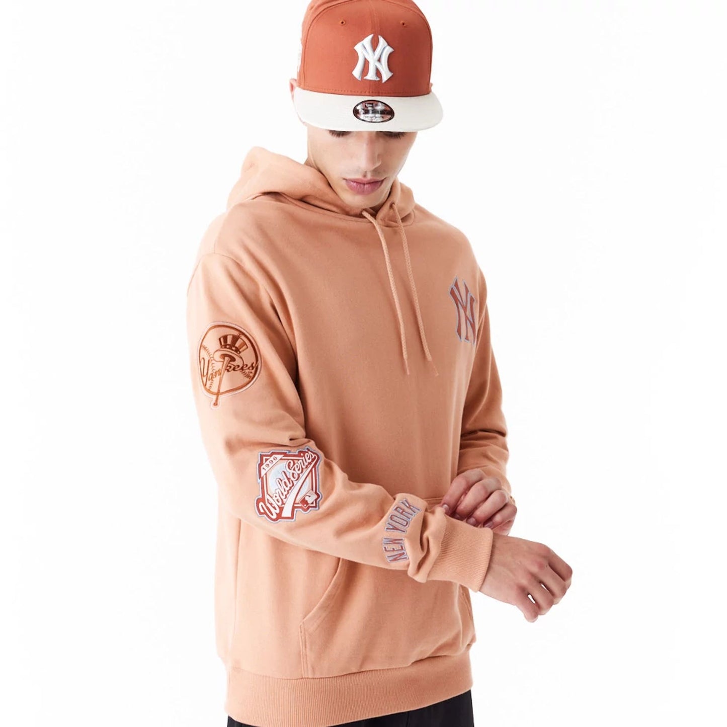 The Male model is wearing New York Yankees MLB World Series Brown Oversized Pullover Hoodie 7