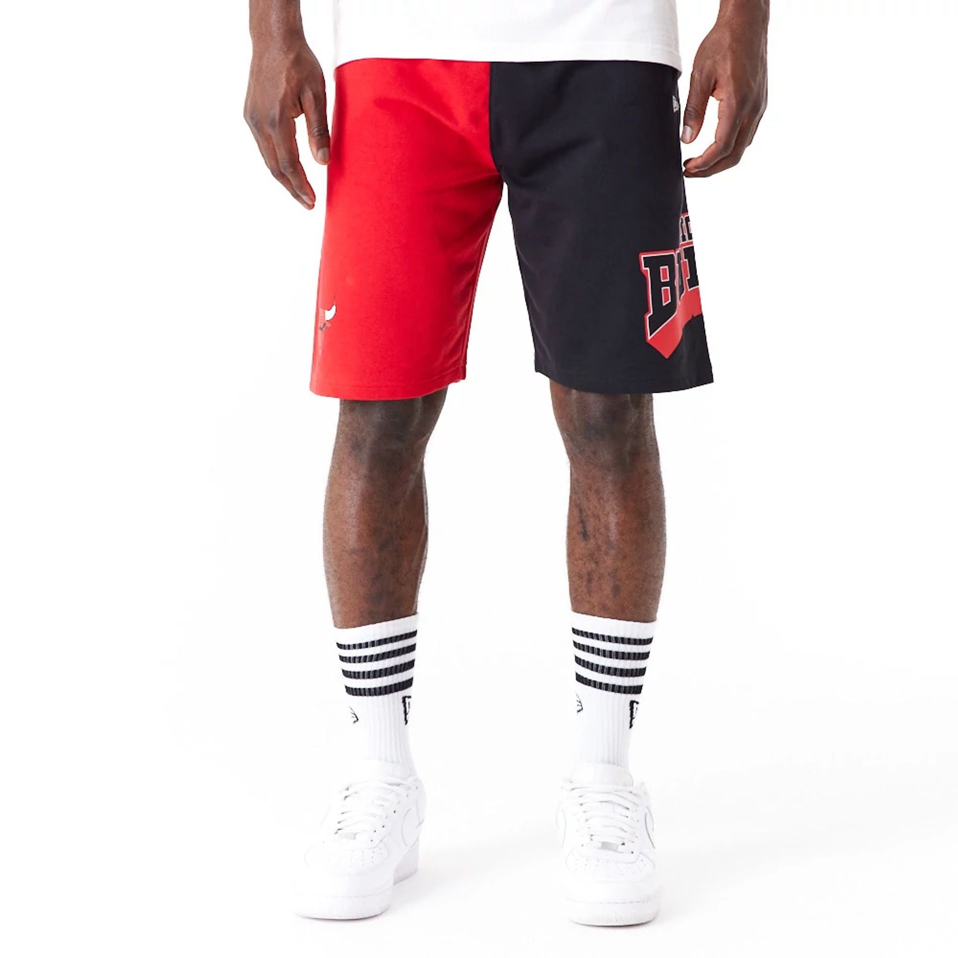 The Male model is wearing Chicago Bulls NBA Graphic Red Shorts 1