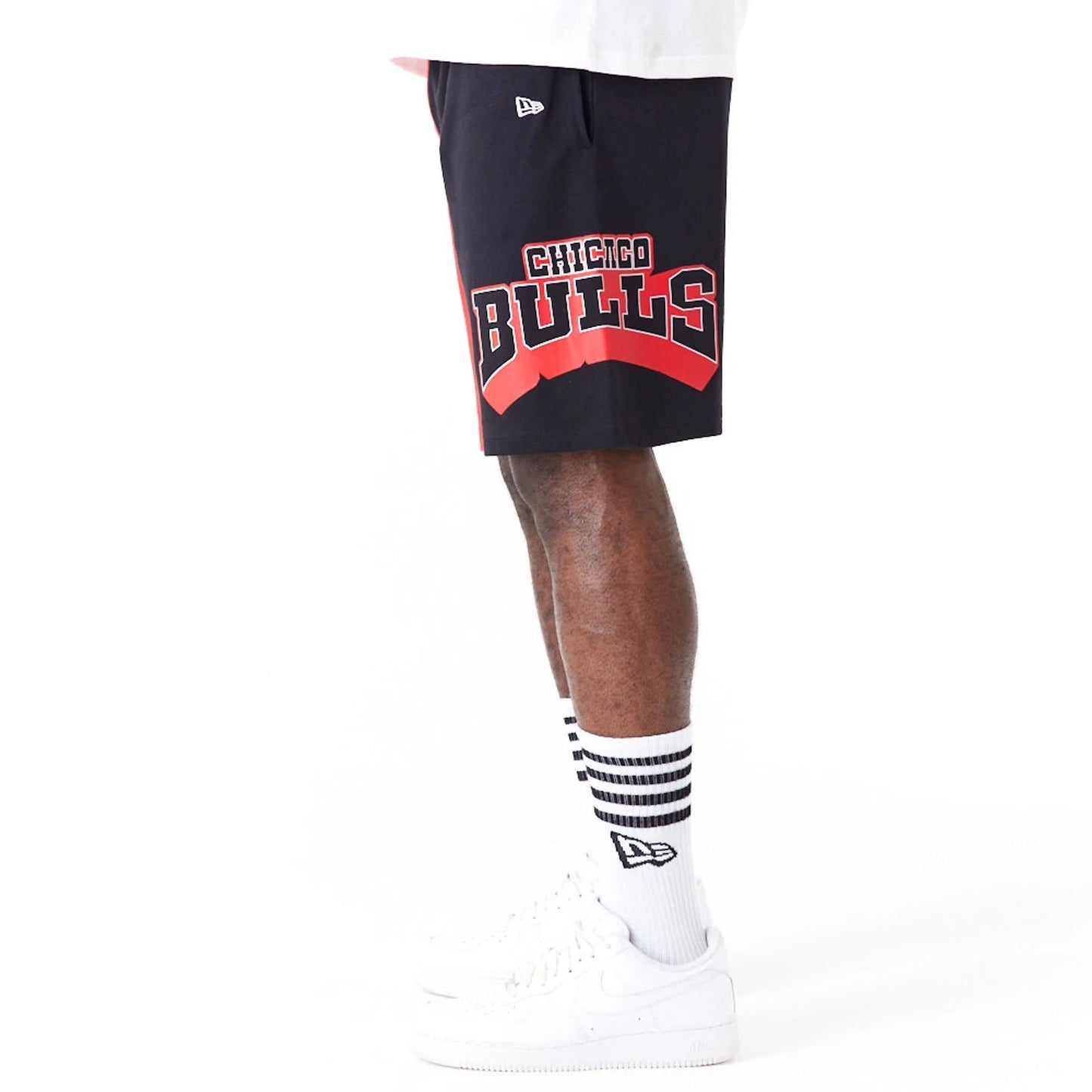 The Male model is wearing Chicago Bulls NBA Graphic Red Shorts 6