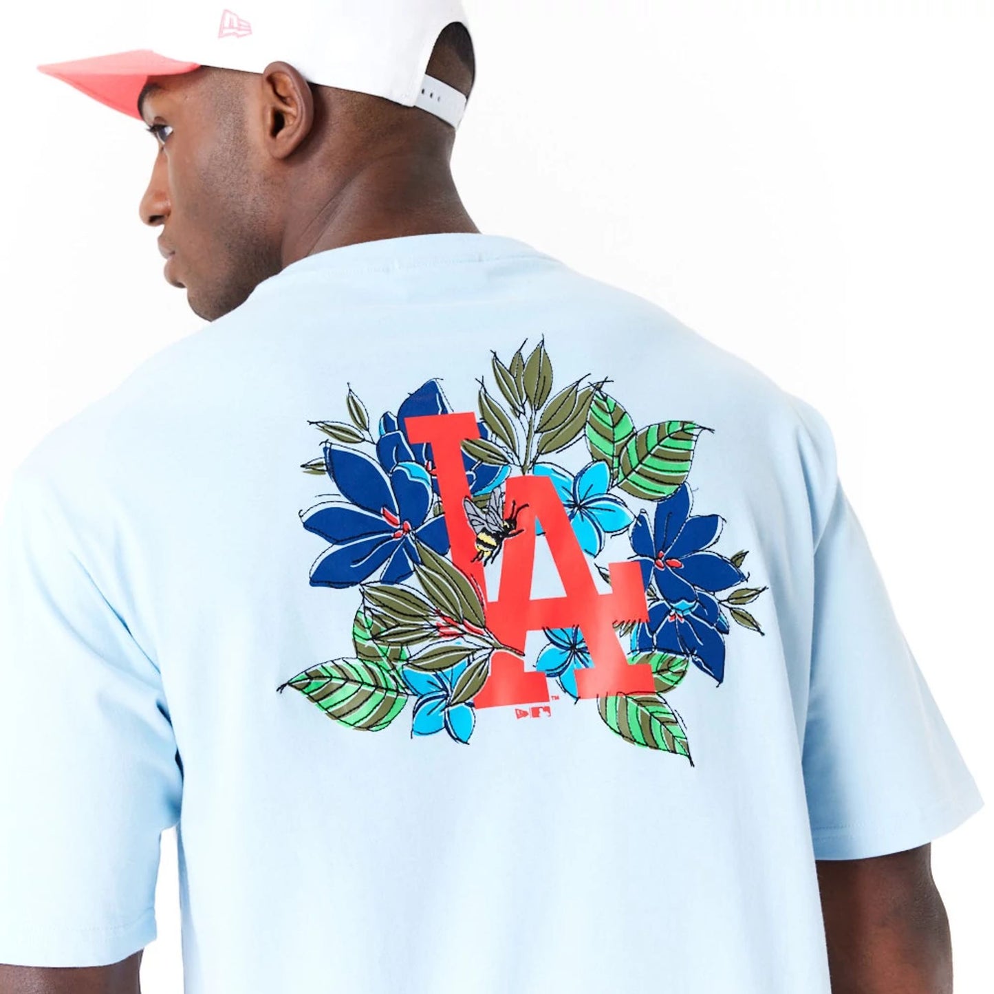 The Male model is wearing LA Dodgers MLB Floral Graphic Pastel Blue Oversized T-Shirt 5