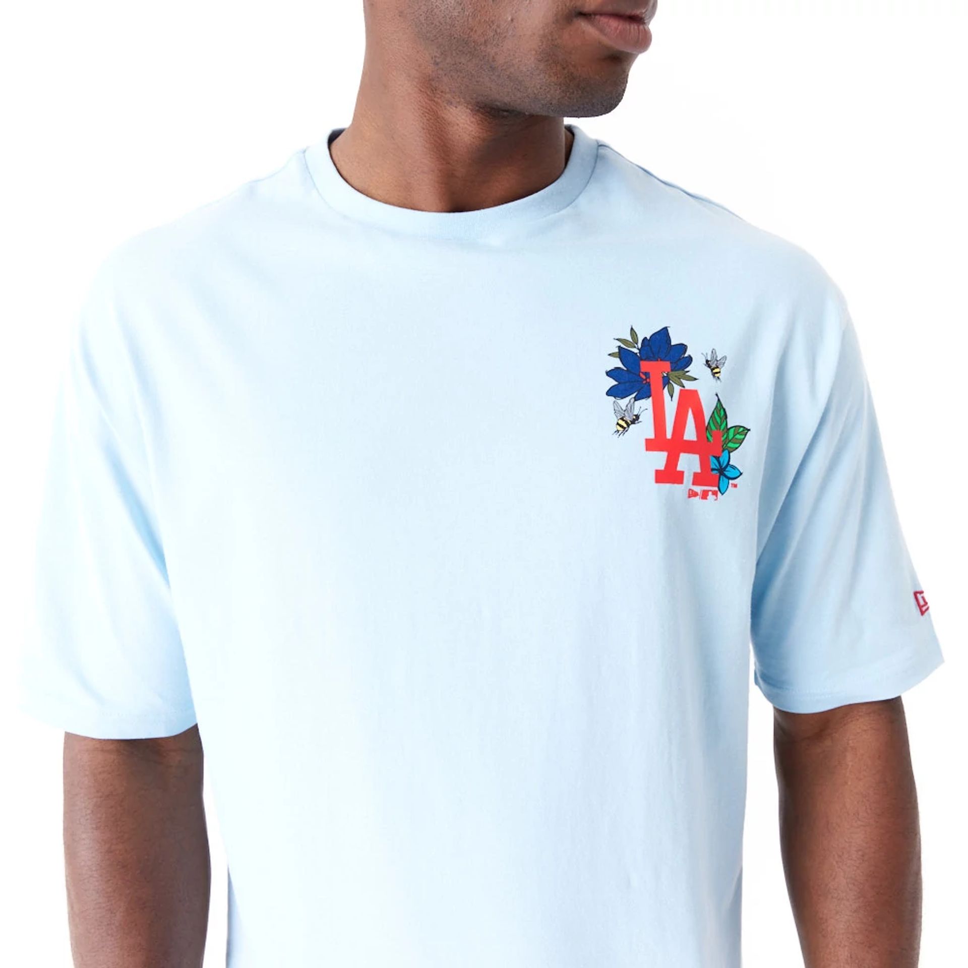 The Male model is wearing LA Dodgers MLB Floral Graphic Pastel Blue Oversized T-Shirt 6