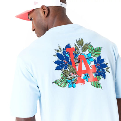 The Male model is wearing LA Dodgers MLB Floral Graphic Pastel Blue Oversized T-Shirt 7