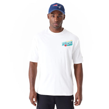 The Male model is wearing NFL Pro Bowl Hawaii NFC Floral Graphic White Oversized T-Shirt 1