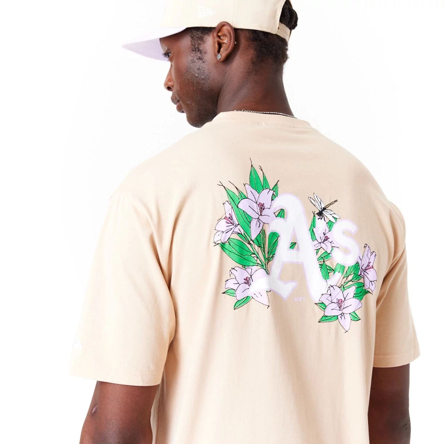 The Male model is wearing Oakland Athletics MLB Floral Graphic Light Beige Oversized T-Shirt 5