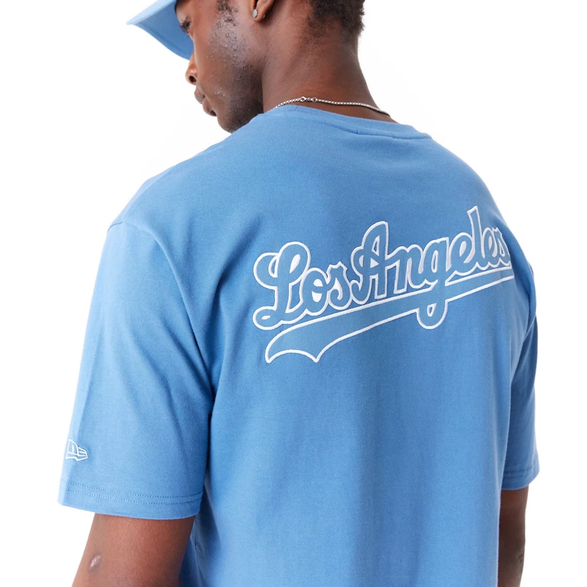 The Male model is wearing LA Dodgers World Series Blue Oversized T-Shirt 2