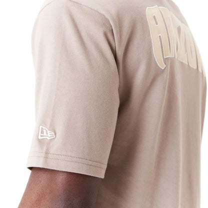 The Male model is wearing Arizona Diamondbacks World Series Pastel Brown Oversized T-Shirt 8