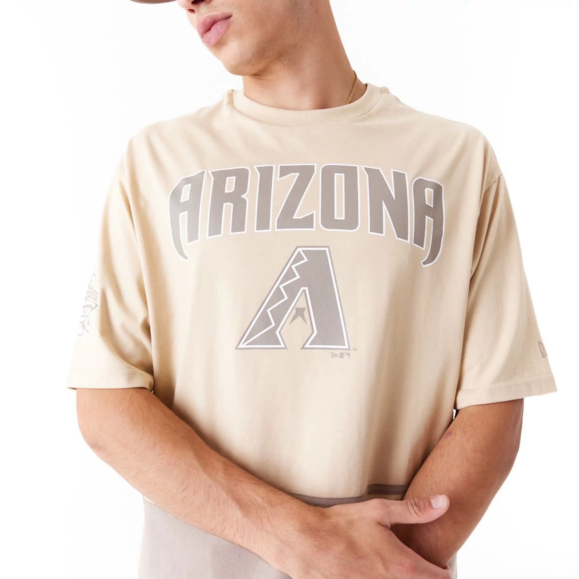 The Male model is wearing Arizona Diamondbacks World Series Light Beige Oversized T-Shirt 2