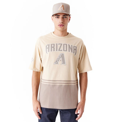 The Male model is wearing Arizona Diamondbacks World Series Light Beige Oversized T-Shirt 1