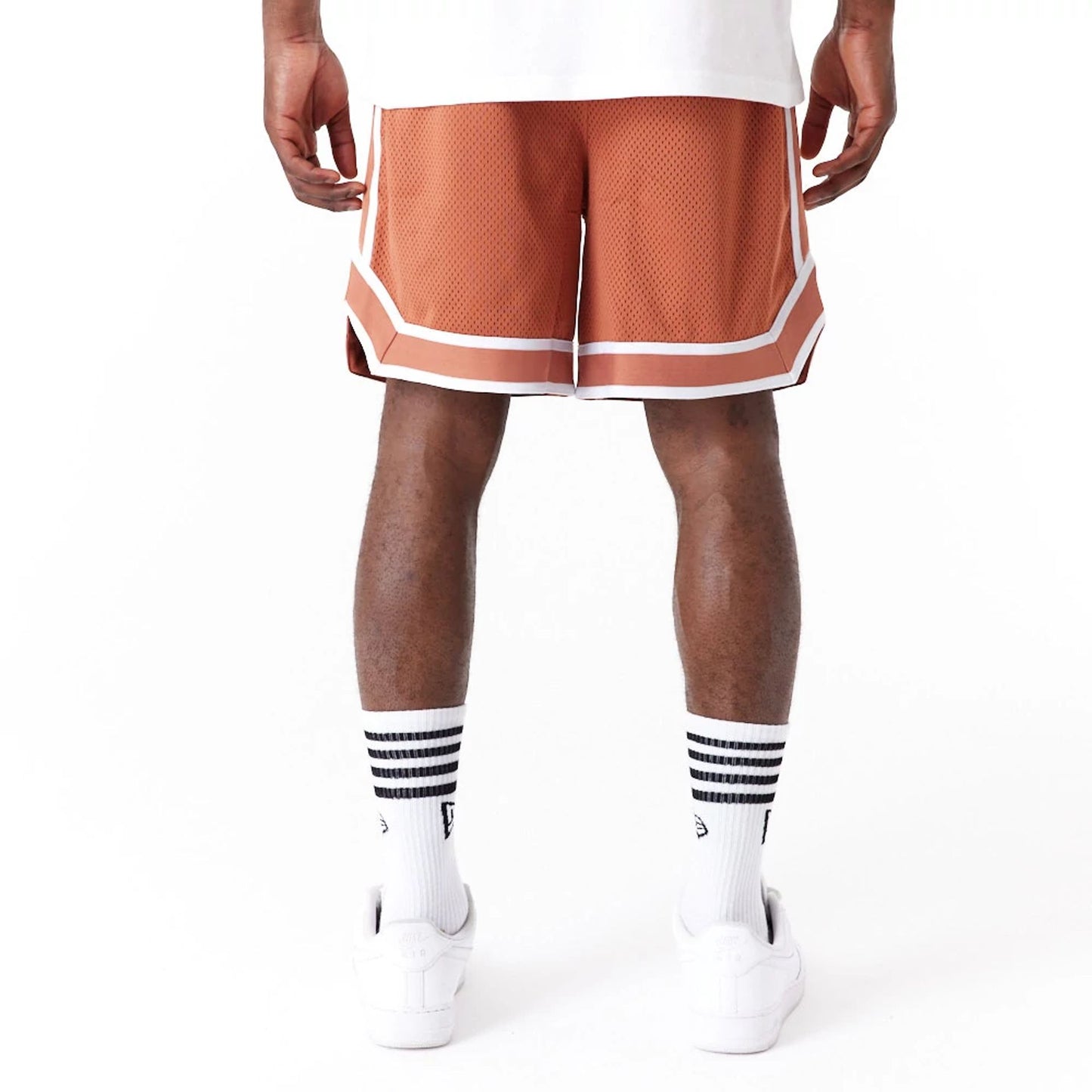 The Male model is wearing New York Yankees World Series Brown Mesh Shorts 3